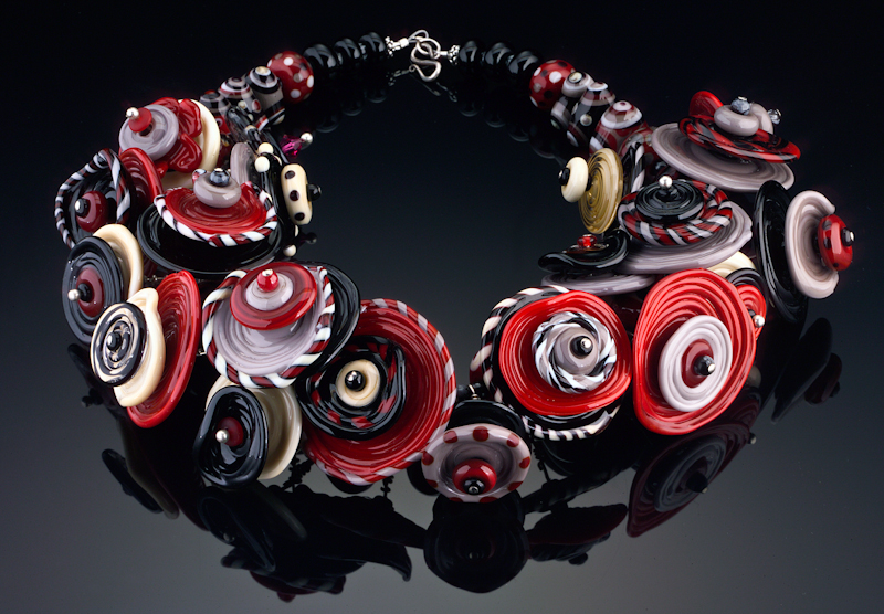 RedSeaDisks.jpg :: Glass Jewelry by Martha Giberson
Photography by Steve Gyurina, Artopia Art Imaging
99R Washington Street, Melrose, MA 02176
781-665-1122, 877-474-6278, sg@artopia.net