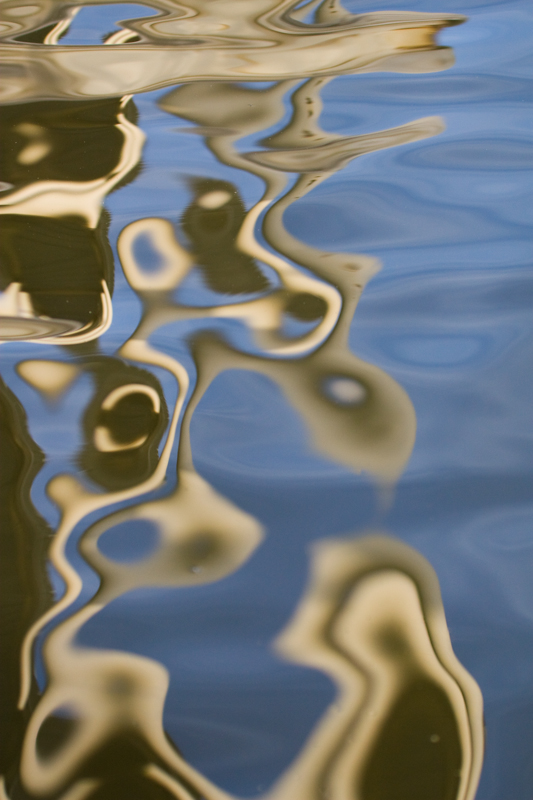 Dock and Sky on Grand Lake.jpg :: The reflection of the overhead cover on the water creates a lava lamp inspired reflection. (A2:3) (LE3k)