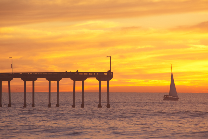 Fireset.jpg :: A firery Sunset backdrops this lone sailboat making it's way home. (A2:3) (LE5k)