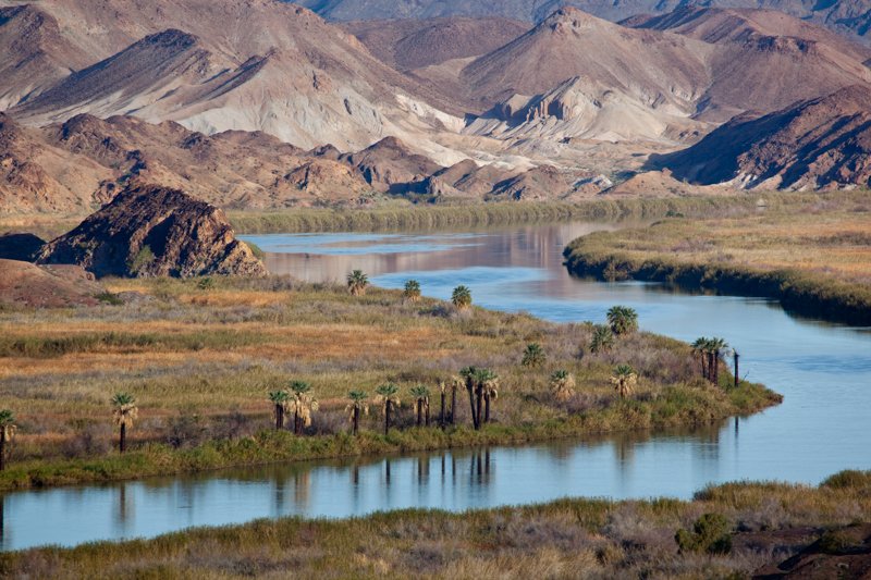 Lower Colorado River.jpg :: As a river flattens out, it meanders.  This lower section of the Colorado River near Yuma leads out eyes to the foothills in the background. (A2:3) (LE5k)