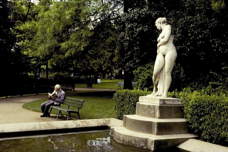 reading on a bench Paris France.jpg