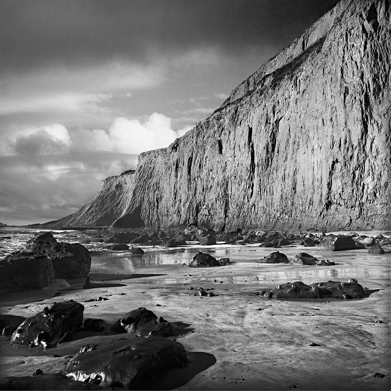 Coast - Tunitas Creek Cliffs.jpg :: Tunitas Creek Beach on the San Mateo County Coast on the San Francisco Peninsula.  The exposure was made at 4:15 PM on January 14, 2014 on Kodak TMAX 400 film in a Hasselblad 500 C/M through a 150 mm lens behind a red filter.  The lens was set at an aperture of f/11 and a 1/125 second shutter speed.  