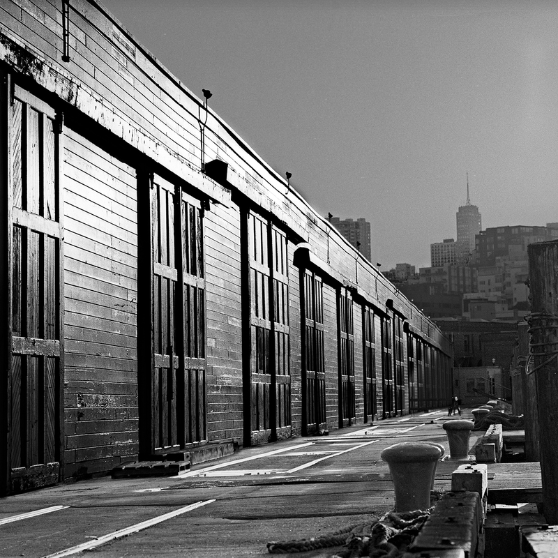 San Francisco - Pier 17.jpg :: Pier 17 on the San Francisco Embarcadero. Exposed at 4:30 PM on November 10, 1985 through a 150 mm lens on Hasselblad 500 CM using TMax 100 film at f22 and 1/500 of a second with no filter.    To see a rectangular version of this image, click on \