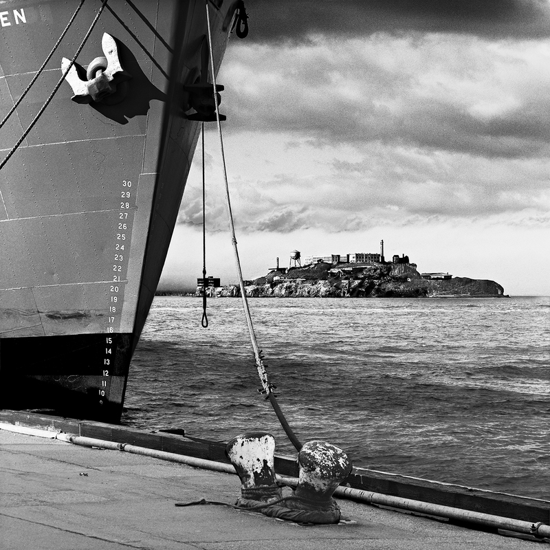 San Francisco -- Hard Time - Alcatraz and the Jeremiah OBrien.jpg :: Alcatraz from Pier 45 at Fisherman's Wharf in San Francisco.  Exposed at 3:00 PM on February 1, 2014 through a 150 mm lens behind a red filter on a Hasselblad 500 CM with a shutter speed of 1/125th of a second and an aperture of f/16.