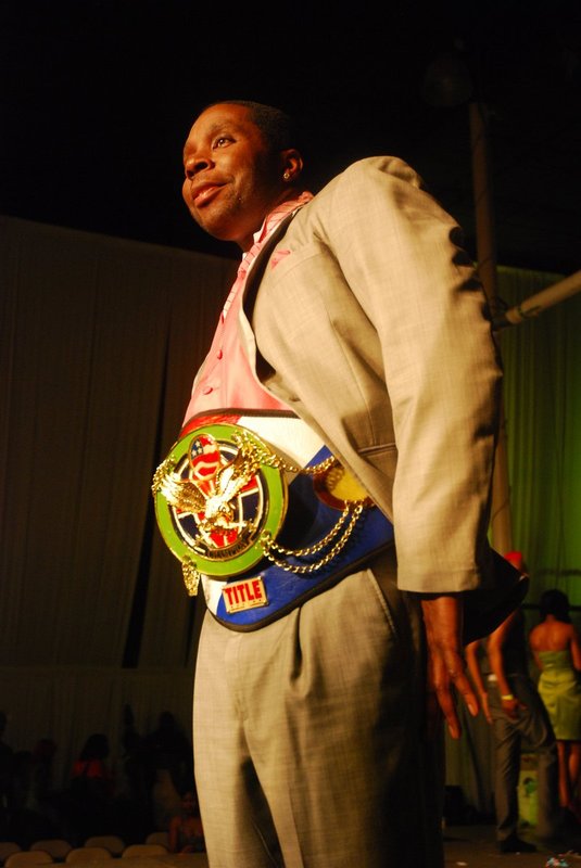 Kedric Cranford takes the belt at Arganics Show.jpg