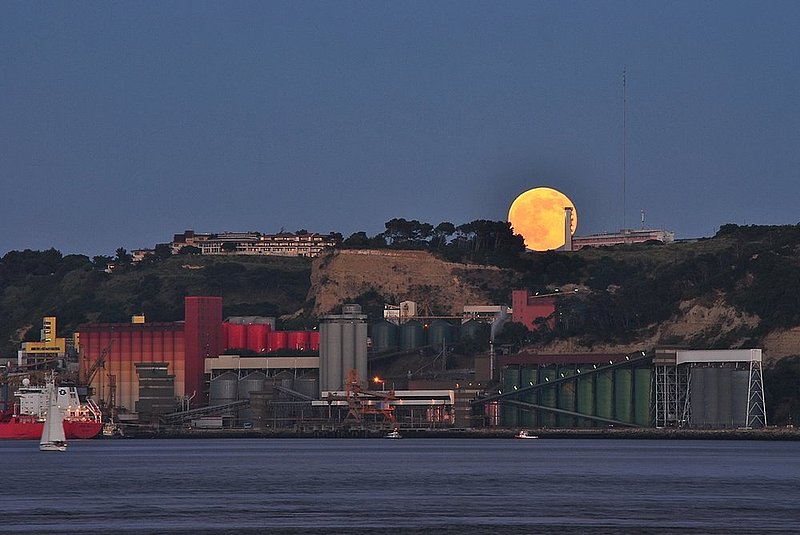 South bank of the tagus river under the big moon Lisbon face.jpg