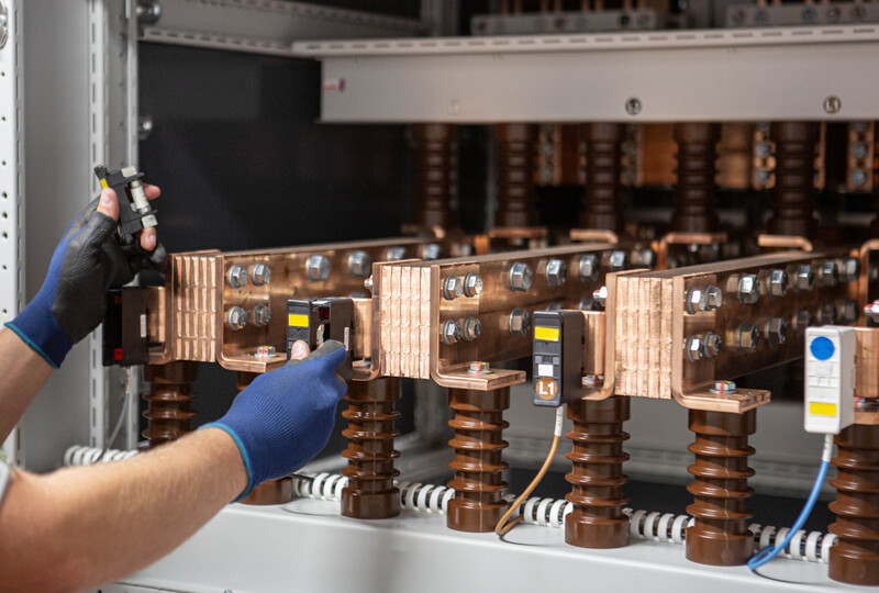 Component Maintenance  Copper Busbar  Isolator.jpg :: Detailed documentation of an isolator maintenance procedure on a main copper busbar. Emphasizing safety and precision in live electrical environments.