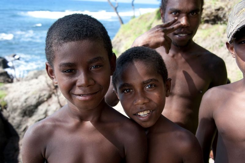 BOYS OF TANNA.jpg :: ISLAND OF TANNA, VANUATU
These two young boys are escorted to the sea by men from their village to complete an ancient two week physical and painful ritual that will culminate in the conversion of their social status in the village and in their family from boys to men.  Following this ritual, their mother will not be allowed to scold or discipline them again.