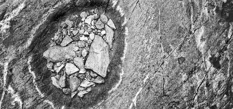 GLACIAL TILL.jpg :: TWENTY LAKES BASIN - HOOVER WILDERNESS, CALIFORNIA
After a millennia of carving and polishing, the glaciated granite stone of the Sierra Nevada collects slivers of glacial till in ancient sculpted depressions. 
