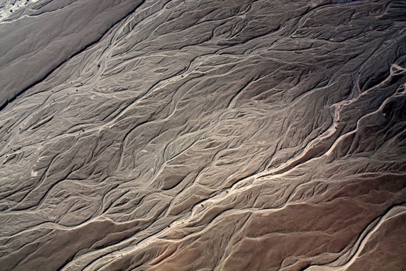 Bernardo Roca-Rey Ross_Ro_Seco_Nazca_LQ1.jpg :: Aerial view from a dry river in the desert of Nazca, Peru.