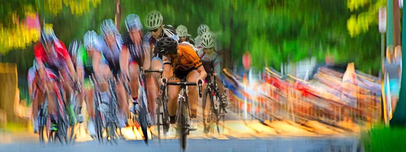 Chase_RF.jpg :: Each year at designated times, planned years or days in advance, cyclists will turn the streets of a city or the back roads of a quiet countryside into a blur of colors as they compete for a space on the winners podium, and the dream of one day being respected by their peers.
