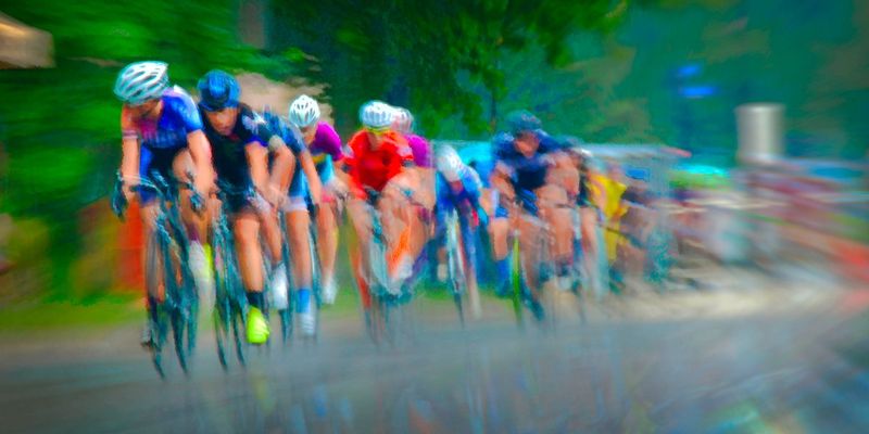 Chase10.jpg :: Each year at designated times, planned years or days in advance, cyclists will turn the streets of a city or the back roads of a quiet countryside into a blur of colors as they compete for a space on the winners podium, and the dream of one day being respected by their peers.