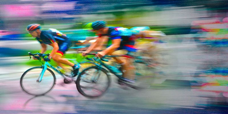 Chase2.jpg :: Each year at designated times, planned years or days in advance, cyclists will turn the streets of a city or the back roads of a quiet countryside into a blur of colors as they compete for a space on the winners podium, and the dream of one day being respected by their peers.