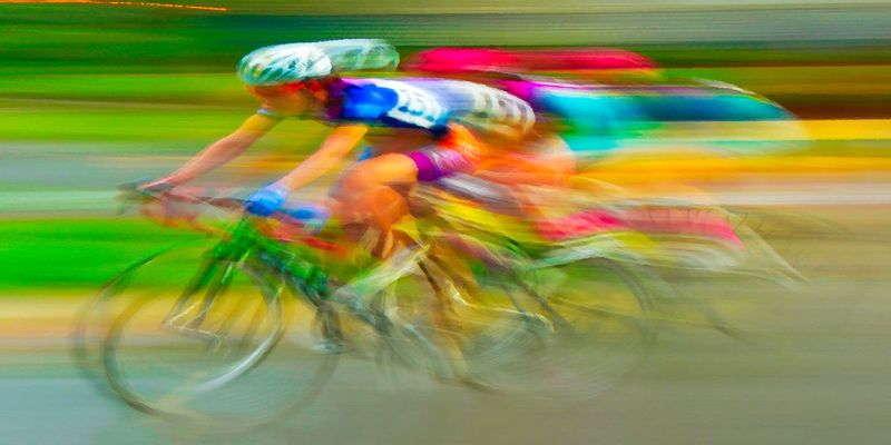 Chase3_RF.jpg :: Each year at designated times, planned years or days in advance, cyclists will turn the streets of a city or the back roads of a quiet countryside into a blur of colors as they compete for a space on the winners podium, and the dream of one day being respected by their peers.