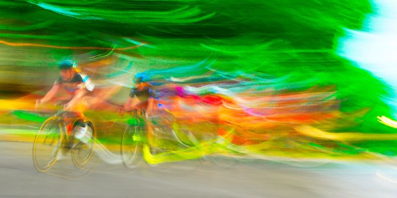 Chase5.jpg :: Each year at designated times, planned years or days in advance, cyclists will turn the streets of a city or the back roads of a quiet countryside into a blur of colors as they compete for a space on the winners podium, and the dream of one day being respected by their peers.