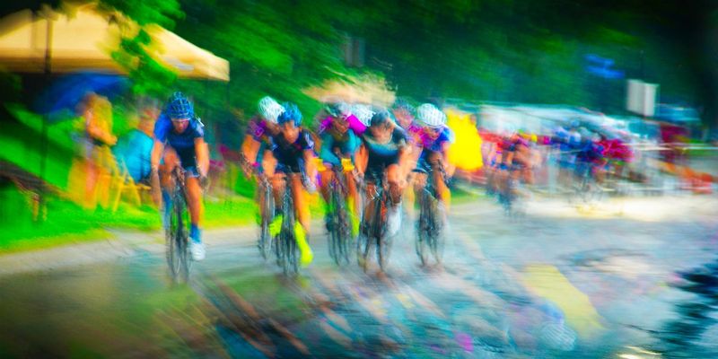 Chase7.jpg :: Each year at designated times, planned years or days in advance, cyclists will turn the streets of a city or the back roads of a quiet countryside into a blur of colors as they compete for a space on the winners podium, and the dream of one day being respected by their peers.