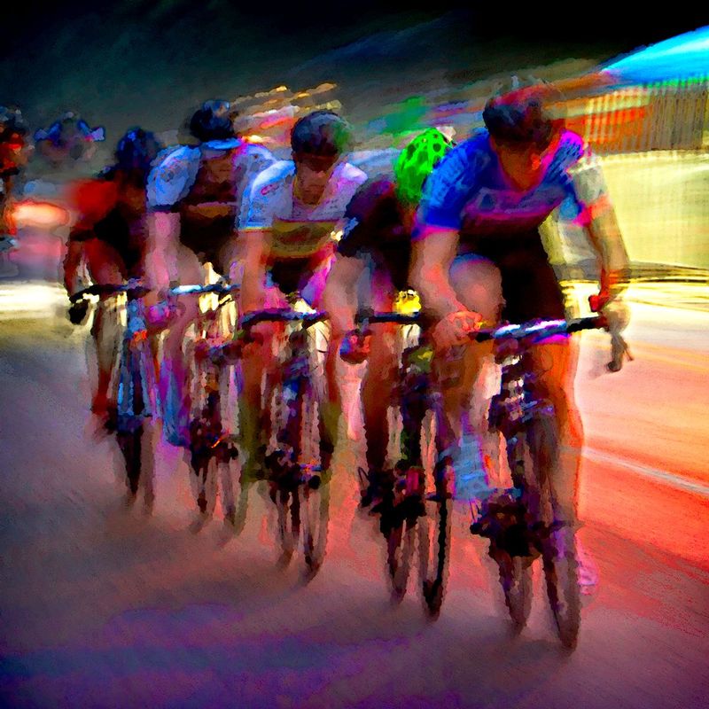 Drafting.jpg :: Each year at designated times, planned years or days in advance, cyclists will turn the streets of a city or the back roads of a quiet countryside into a blur of colors as they compete for a space on the winners podium, and the dream of one day being respected by their peers.