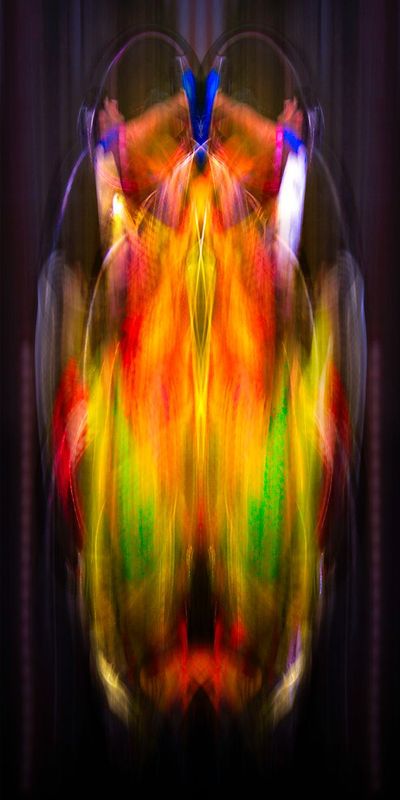 FireBug.jpg :: Once an image of a cyclist, now a symmetrical splash of color, this Rorschach Test reminds me of a brilliantly color insect - or a fire bug.