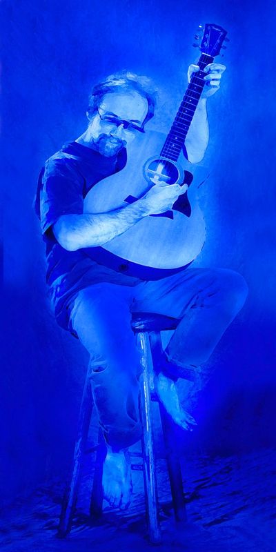 Got the Blues.jpg :: This is a friend of mine - Fred Manfred  Haertel. He is really into playing his guitar in his own style. Sorta like a blue Picasso - look him up on the internet - you will enjoy listening to him play.