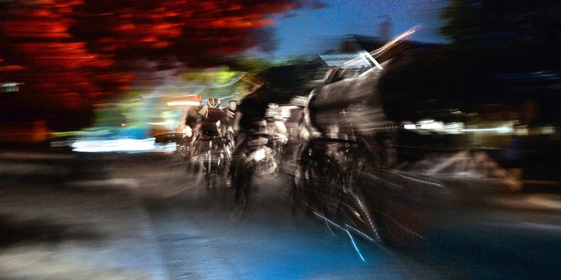 Into the darkness.jpg :: Each year at designated times, planned years or days in advance, cyclists will turn the streets of a city or the back roads of a quiet countryside into a blur of colors as they compete for a space on the winners podium, and the dream of one day being respected by their peers.