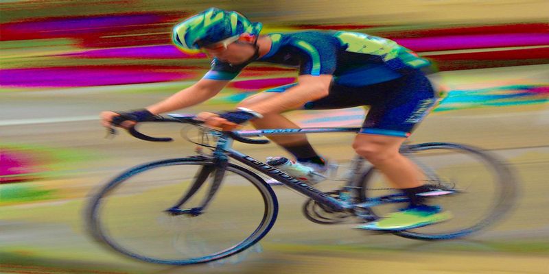 LoanRider-Comp1.jpg :: Each year at designated times, planned years or days in advance, cyclists will turn the streets of a city or the back roads of a quiet countryside into a blur of colors as they compete for a space on the winners podium, and the dream of one day being respected by their peers.