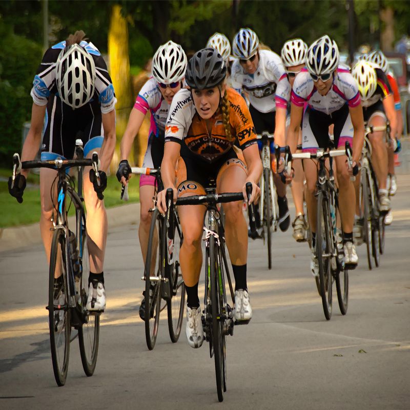 OnMyWay.jpg :: Each year at designated times, planned years or days in advance, cyclists will turn the streets of a city or the back roads of a quiet countryside into a blur of colors as they compete for a space on the winners podium, and the dream of one day being respected by their peers.