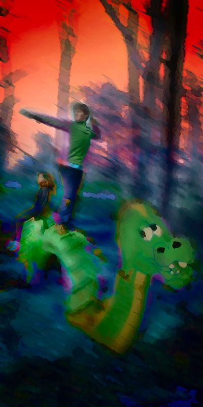 Puff.jpg :: On a journey through a mysterious woods at a halloween farm, this spunky dragon crossed our path - my grandson immediately took control and was off to see the world - my granddaughter was content to go along for the ride - that has been some years ago - we will probably not return to the farm this year - there are other, more grown up things to do.