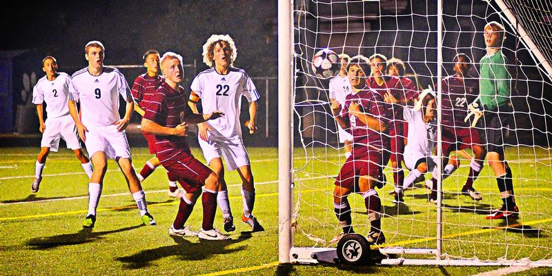 The Realization.jpg :: A winner and a looser - This is truly an awesome image because it shows the ball hitting the net for the final goal scored in the lasts seconds of stoppage time, winning the match_____ for which side - the red or the white  -  take a close look at the image - from the expressions on their faces - can you tell who won 