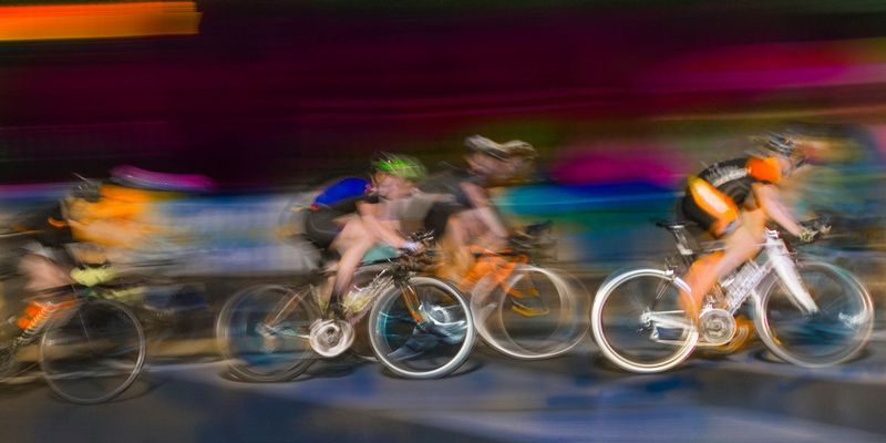 inTheSpotlight.jpg :: Each year at designated times, planned years or days in advance, cyclists will turn the streets of a city or the back roads of a quiet countryside into a blur of colors as they compete for a space on the winners podium, and the dream of one day being respected by their peers.