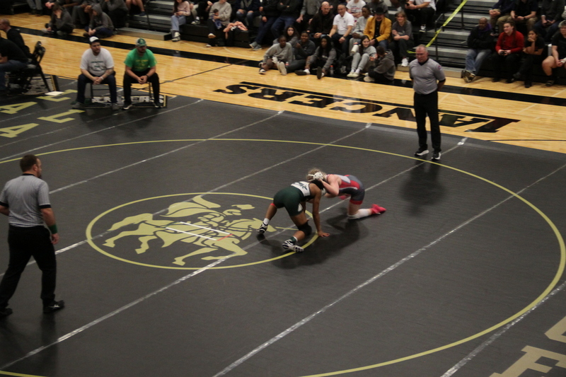 2026 Lafayette Fred Ross Boys and Girls Invitational XXXXV.jpg :: 2026 Lafayette 'Fred Ross' Invitational For both boys and girls. Fred Ross (Coach Ross) was a Wrestling High School Coach at Lafayette High School. Coach Ross coached Little League wrestling as well as High School. A staff of referees officiated the matches. The tournament was exciting with both boys and girls in the same gymnasium girls on one end of the gymnasium and the boys on the other side of the gymnasium. Wildwood, Missouri, United States 01-10-2026 