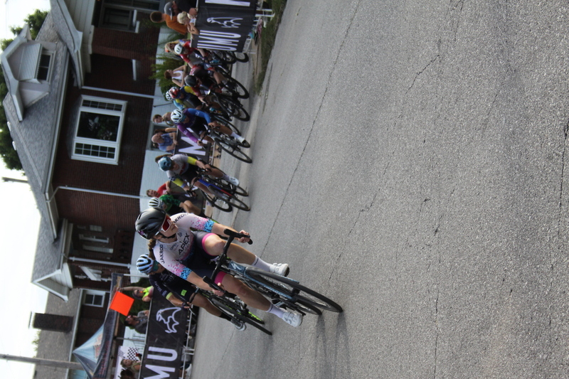 Giro della Montagna 2025 E -C.jpg :: Giro della Montagna 2025/Gateway Cup 2025 - American Criterium Cup 2025 - Women's Pro 1-2, 70 minutes of racing, a field 150, Stop 6 - Bommarito Audi West County Gateway Cup, Four days of racing over Labor Day Weekend, The Bommarito Audi West County Gateway Cup feature four of St. Louis signature neighborhoods and the final stage of the American Criterium Cup at the Classic Giro della Montagna Criterium. -USA Cycling- Pelton - in a bicycle race, the term -peloton- refers to the main group of riders, also known as the -pack- or -bunch.- Riders race in a pack to draft, which means they ride closely together to save energy and improve speed.   