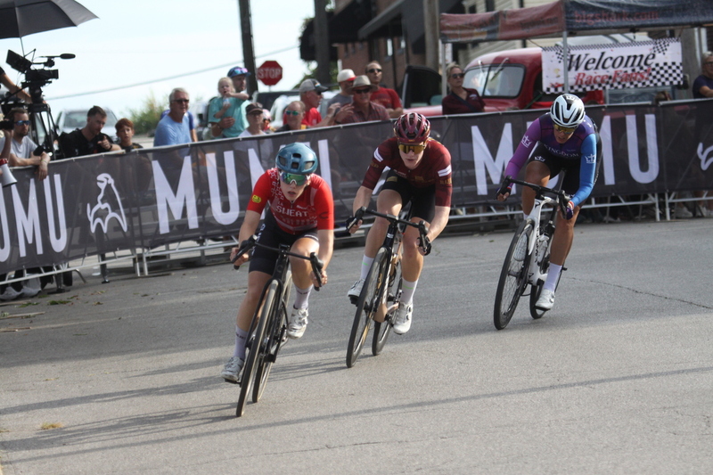 Giro della Montagna 2025 E -LVI.jpg :: Giro della Montagna 2025/Gateway Cup 2025 - American Criterium Cup 2025- August 31st 2025 - Women's Pro Cycling, CAT 1-2, 70 minutes of racing, a field of 150, The Giro della Montagna presented by VOLPI FOODS - the third stop of the Bommarito Audi West County Gateway Cup and the final event on the American Criterium Cup. The course is called -The Hill- for a reason long and rectangular the uphill race from turn 2 to turn 3 decides the race. Turn 4 leads to a Mach 5 downhill sprint, making lap positioning critical. -presented by VOLPI FOODS- Stop 6 - Bommarito Audi West County Gateway Cup, Four days of racing over Labor Day Weekend, The Bommarito Audi West County Gateway Cup feature four of St. Louis Signature neighborhoods and the final stage of the American Criterium Cup at the Classic Giro della Montagna Criterium. - USA Cycling -