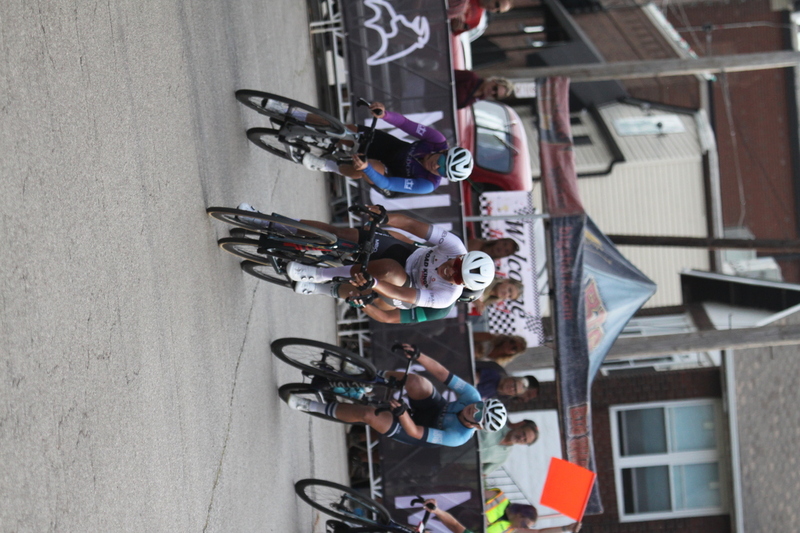 Giro della Montagna 2025 E -LXXXIII.jpg :: Giro della Montagna 2025/Gateway Cup 2025 - American Criterium Cup 2025 - Women's Pro 1-2, 70 minutes of racing, a field 150, Stop 6 - Bommarito Audi West County Gateway Cup, Four days of racing over Labor Day Weekend, The Bommarito Audi West County Gateway Cup feature four of St. Louis signature neighborhoods and the final stage of the American Criterium Cup at the Classic Giro della Montagna Criterium. -USA Cycling- Pelton - in a bicycle race, the term -peloton- refers to the main group of riders, also known as the -pack- or -bunch.- Riders race in a pack to draft, which means they ride closely together to save energy and improve speed.   