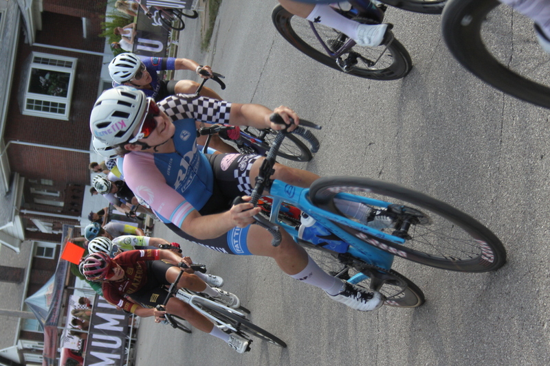Giro della Montagna 2025 F -V.jpg :: Giro della Montagna 2025/Gateway Cup 2025 - American Criterium Cup 2025 - Women's Pro 1-2, 70 minutes of racing, a field 150, Stop 6 - Bommarito Audi West County Gateway Cup, Four days of racing over Labor Day Weekend, The Bommarito Audi West County Gateway Cup feature four of St. Louis signature neighborhoods and the final stage of the American Criterium Cup at the Classic Giro della Montagna Criterium. -USA Cycling- Pelton - in a bicycle race, the term -peloton- refers to the main group of riders, also known as the -pack- or -bunch.- Riders race in a pack to draft, which means they ride closely together to save energy and improve speed.   
