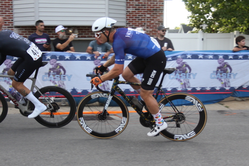 Giro della Montagna 2025 F -XXVI.jpg :: Giro della Montagna 2025, Gateway Cup 2025, August 31st 2025, Men's CAT 1, 70 Minutes of racing, a field of 150- The Giro della Montagna presented by VOLPI FOODS - the third stop of the Bommarito Audi West County Gateway Cup and the final event on the American Criterium Cup. The course is called -The Hill- for a reason long and rectangular the uphill race from turn 2 to turn 3 decides the race. Turn 4 leads to a Mach 5 downhill sprint, making lap positioning critical. -Presented by VOLPI FOODS- Category 1 (CAT I) The highest level, reserved for elite riders who have demonstrated exceptional skill and performance. -USA Cycling- UCI Racing License - Designed for individuals racing in UCI events on US soil or abroad, USA Cycling's International Membership grants you immediate access to thousands bike races around the world. -USA Cycling-
