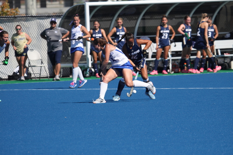 IMG_0375.jpg :: Saint Louis University (SLU) Women's Field Hockey vs University of California Davis 2025 at the SLU Field Hockey Complex. UC Davis won 2 to 1. The UC Davis players are wearing pink shoes and there are Pink Ribbons painted on the players sticks. Today is Billikens Pink Game for Breast Cancer Awareness and Alumnae Day. This is the second season at the new SLU Field Hockey Complex, and it marks, the 50th anniversary of the St. Louis University Field Hockey program which began in 1975. NCAA Division I 