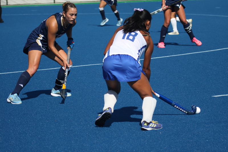 IMG_0395.jpg :: Saint Louis University (SLU) Women's Field Hockey vs University of California Davis 2025 at the SLU Field Hockey Complex. UC Davis won 2 to 1. The UC Davis players are wearing pink shoes and there are Pink Ribbons painted on the players sticks. Today is Billikens Pink Game for Breast Cancer Awareness and Alumnae Day. This is the second season at the new SLU Field Hockey Complex, and it marks, the 50th anniversary of the St. Louis University Field Hockey program which began in 1975. NCAA Division I 