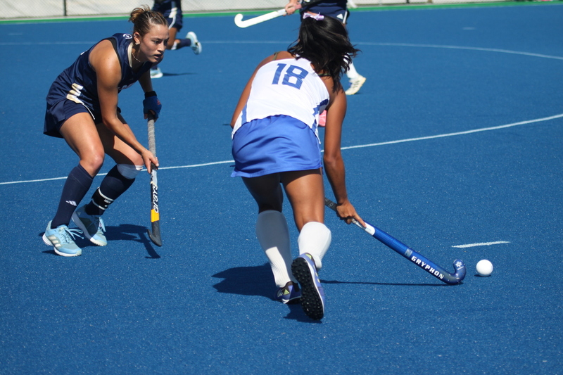 IMG_0396.jpg :: Saint Louis University (SLU) Women's Field Hockey vs University of California Davis 2025 at the SLU Field Hockey Complex. UC Davis won 2 to 1. The UC Davis players are wearing pink shoes and there are Pink Ribbons painted on the players sticks. Today is Billikens Pink Game for Breast Cancer Awareness and Alumnae Day. This is the second season at the new SLU Field Hockey Complex, and it marks, the 50th anniversary of the St. Louis University Field Hockey program which began in 1975. NCAA Division I 