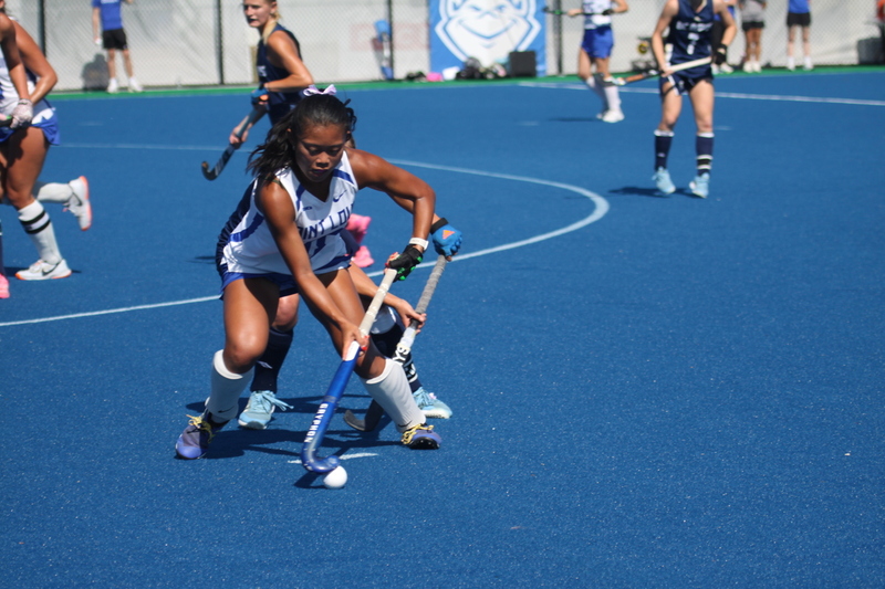 IMG_0398.jpg :: Saint Louis University (SLU) Women's Field Hockey vs University of California Davis 2025 at the SLU Field Hockey Complex. UC Davis won 2 to 1. The UC Davis players are wearing pink shoes and there are Pink Ribbons painted on the players sticks. Today is Billikens Pink Game for Breast Cancer Awareness and Alumnae Day. This is the second season at the new SLU Field Hockey Complex, and it marks, the 50th anniversary of the St. Louis University Field Hockey program which began in 1975. NCAA Division I 