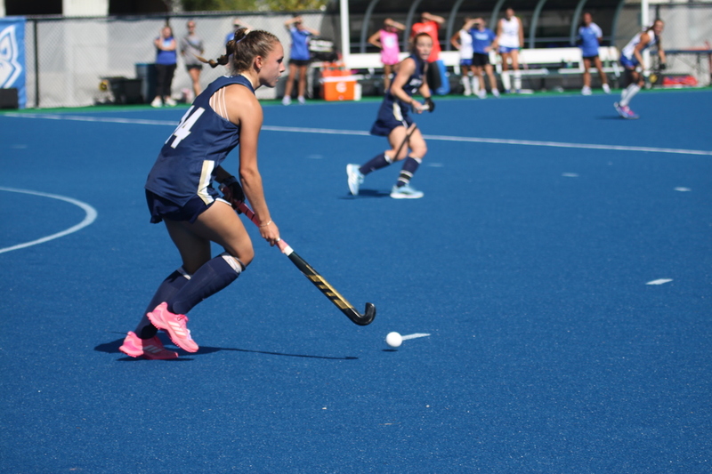 IMG_0412(1).jpg :: Saint Louis University (SLU) Women's Field Hockey vs University of California Davis 2025 at the SLU Field Hockey Complex. UC Davis won 2 to 1. The UC Davis players are wearing pink shoes and there are Pink Ribbons painted on the players sticks. Today is Billikens Pink Game for Breast Cancer Awareness and Alumnae Day. This is the second season at the new SLU Field Hockey Complex, and it marks, the 50th anniversary of the St. Louis University Field Hockey program which began in 1975. NCAA Division I 