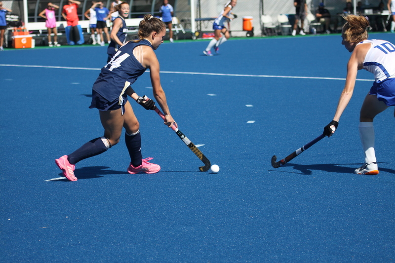 IMG_0413.jpg :: Saint Louis University (SLU) Women's Field Hockey vs University of California Davis 2025 at the SLU Field Hockey Complex. UC Davis won 2 to 1. The UC Davis players are wearing pink shoes and there are Pink Ribbons painted on the players sticks. Today is Billikens Pink Game for Breast Cancer Awareness and Alumnae Day. This is the second season at the new SLU Field Hockey Complex, and it marks, the 50th anniversary of the St. Louis University Field Hockey program which began in 1975. NCAA Division I 