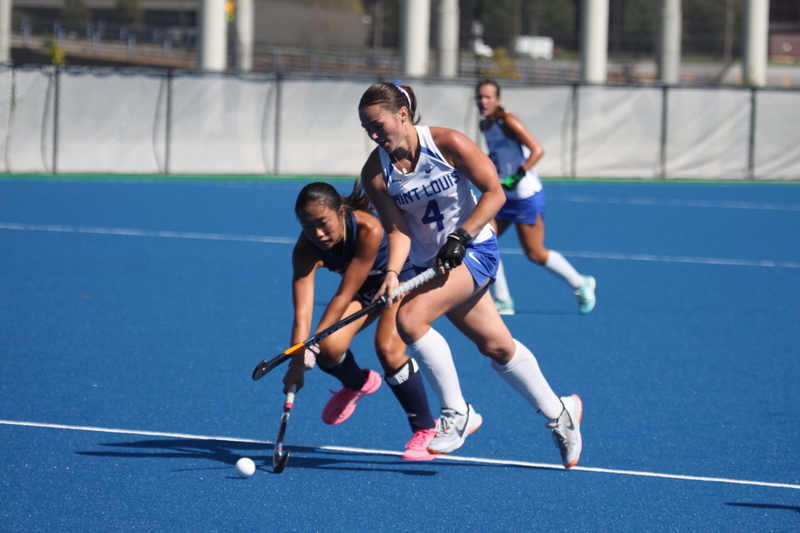 IMG_0420.jpg :: Saint Louis University (SLU) Women's Field Hockey vs University of California Davis 2025 at the SLU Field Hockey Complex. UC Davis won 2 to 1. The UC Davis players are wearing pink shoes and there are Pink Ribbons painted on the players sticks. Today is Billikens Pink Game for Breast Cancer Awareness and Alumnae Day. This is the second season at the new SLU Field Hockey Complex, and it marks, the 50th anniversary of the St. Louis University Field Hockey program which began in 1975. NCAA Division I 