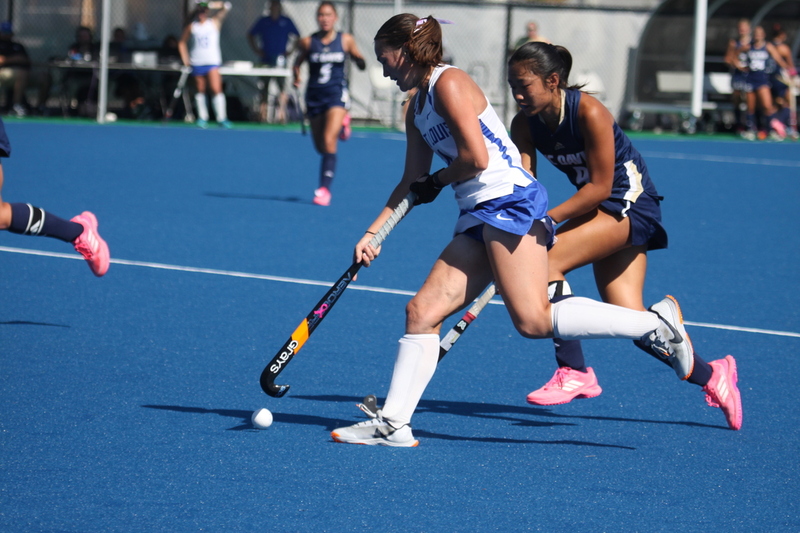 IMG_0422.jpg :: Saint Louis University (SLU) Women's Field Hockey vs University of California Davis 2025 at the SLU Field Hockey Complex. UC Davis won 2 to 1. The UC Davis players are wearing pink shoes and there are Pink Ribbons painted on the players sticks. Today is Billikens Pink Game for Breast Cancer Awareness and Alumnae Day. This is the second season at the new SLU Field Hockey Complex, and it marks, the 50th anniversary of the St. Louis University Field Hockey program which began in 1975. NCAA Division I 
