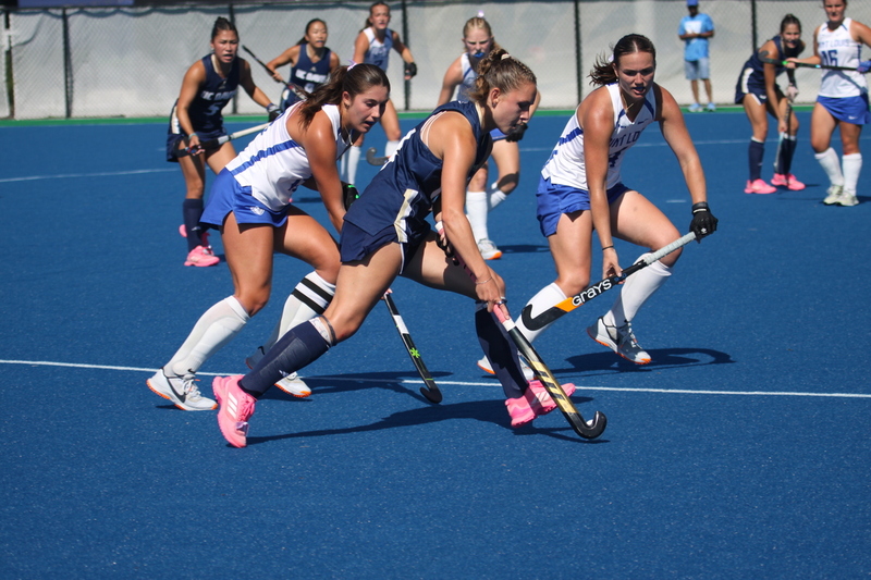 IMG_0430(1).jpg :: Saint Louis University (SLU) Women's Field Hockey vs University of California Davis 2025 at the SLU Field Hockey Complex. UC Davis won 2 to 1. The UC Davis players are wearing pink shoes and there are Pink Ribbons painted on the players sticks. Today is Billikens Pink Game for Breast Cancer Awareness and Alumnae Day. This is the second season at the new SLU Field Hockey Complex, and it marks, the 50th anniversary of the St. Louis University Field Hockey program which began in 1975. NCAA Division I 