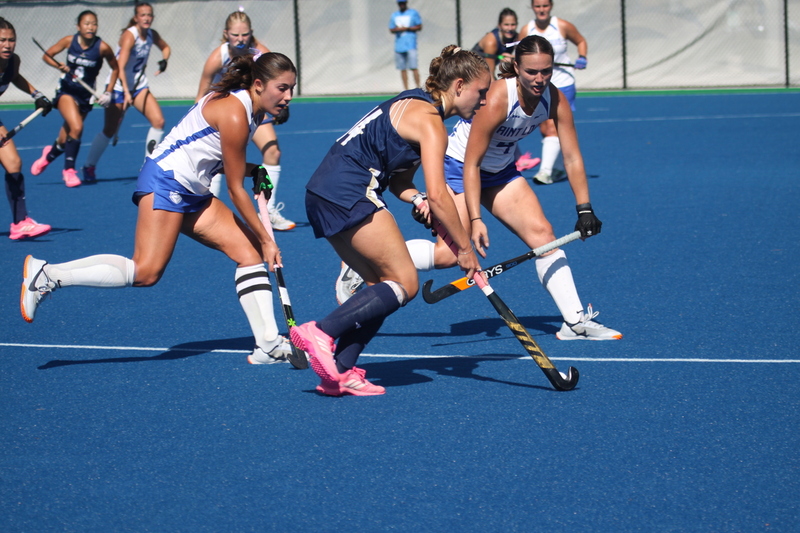 IMG_0431(1).jpg :: Saint Louis University (SLU) Women's Field Hockey vs University of California Davis 2025 at the SLU Field Hockey Complex. UC Davis won 2 to 1. The UC Davis players are wearing pink shoes and there are Pink Ribbons painted on the players sticks. Today is Billikens Pink Game for Breast Cancer Awareness and Alumnae Day. This is the second season at the new SLU Field Hockey Complex, and it marks, the 50th anniversary of the St. Louis University Field Hockey program which began in 1975. NCAA Division I 