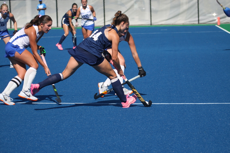 IMG_0432(1).jpg :: Saint Louis University (SLU) Women's Field Hockey vs University of California Davis 2025 at the SLU Field Hockey Complex. UC Davis won 2 to 1. The UC Davis players are wearing pink shoes and there are Pink Ribbons painted on the players sticks. Today is Billikens Pink Game for Breast Cancer Awareness and Alumnae Day. This is the second season at the new SLU Field Hockey Complex, and it marks, the 50th anniversary of the St. Louis University Field Hockey program which began in 1975. NCAA Division I 