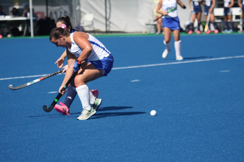 IMG_0438.jpg :: Saint Louis University (SLU) Women's Field Hockey vs University of California Davis 2025 at the SLU Field Hockey Complex. UC Davis won 2 to 1. The UC Davis players are wearing pink shoes and there are Pink Ribbons painted on the players sticks. Today is Billikens Pink Game for Breast Cancer Awareness and Alumnae Day. This is the second season at the new SLU Field Hockey Complex, and it marks, the 50th anniversary of the St. Louis University Field Hockey program which began in 1975. NCAA Division I 