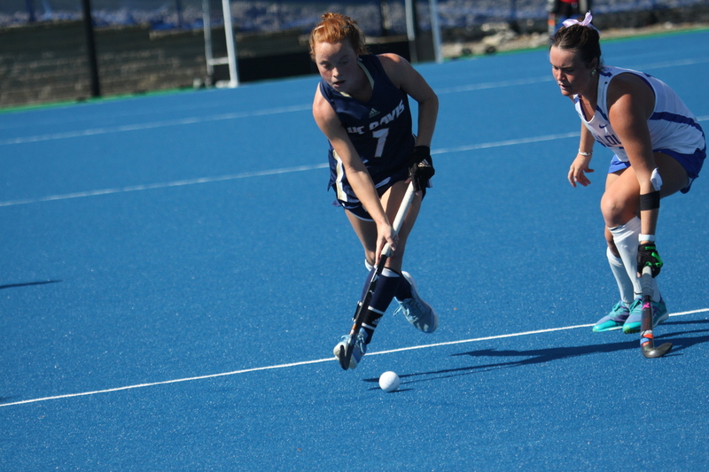 IMG_0444.jpg :: Saint Louis University (SLU) Women's Field Hockey vs University of California Davis 2025 at the SLU Field Hockey Complex. UC Davis won 2 to 1. The UC Davis players are wearing pink shoes and there are Pink Ribbons painted on the players sticks. Today is Billikens Pink Game for Breast Cancer Awareness and Alumnae Day. This is the second season at the new SLU Field Hockey Complex, and it marks, the 50th anniversary of the St. Louis University Field Hockey program which began in 1975. NCAA Division I 