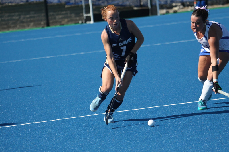 IMG_0445(1).jpg :: Saint Louis University (SLU) Women's Field Hockey vs University of California Davis 2025 at the SLU Field Hockey Complex. UC Davis won 2 to 1. The UC Davis players are wearing pink shoes and there are Pink Ribbons painted on the players sticks. Today is Billikens Pink Game for Breast Cancer Awareness and Alumnae Day. This is the second season at the new SLU Field Hockey Complex, and it marks, the 50th anniversary of the St. Louis University Field Hockey program which began in 1975. NCAA Division I 