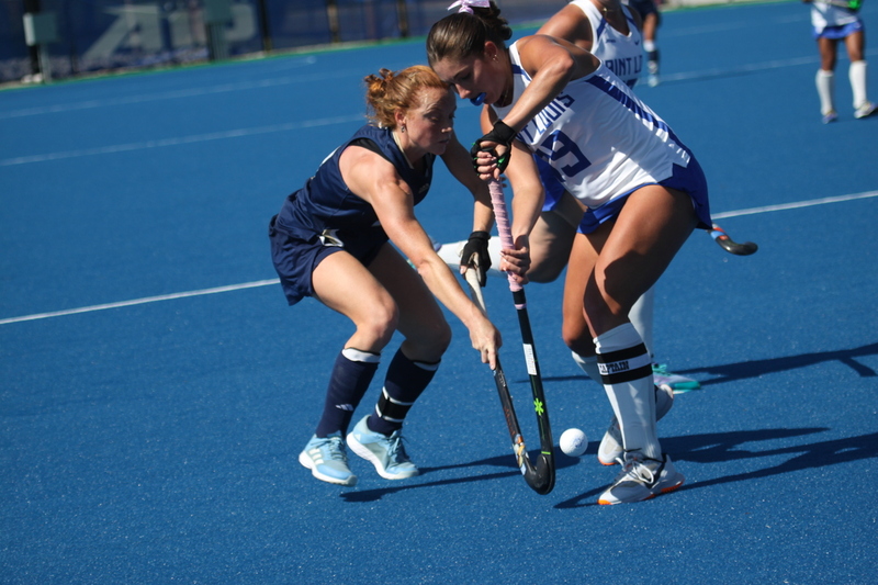 IMG_0446(1).jpg :: Saint Louis University (SLU) Women's Field Hockey vs University of California Davis 2025 at the SLU Field Hockey Complex. UC Davis won 2 to 1. The UC Davis players are wearing pink shoes and there are Pink Ribbons painted on the players sticks. Today is Billikens Pink Game for Breast Cancer Awareness and Alumnae Day. This is the second season at the new SLU Field Hockey Complex, and it marks, the 50th anniversary of the St. Louis University Field Hockey program which began in 1975. NCAA Division I 